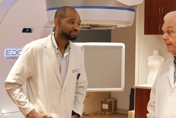 Jana Edwards, lead radiation therapist, Dr. Leander Cannick III and Dr. William “Vic” Tomlinson discuss AnMed’s new Varian Edge linear accelerator. 